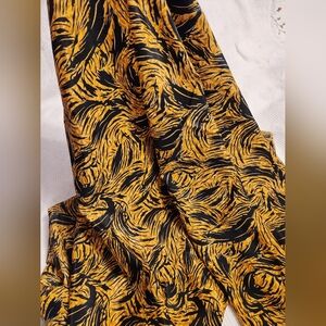 Crepe Gold & Black animal printed fabric